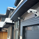 Modern Canadian home with discreet security cameras in winter.