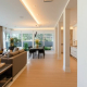 Smart home technology in a modern Toronto home with automated lighting and smart thermostat.