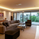 Modern Toronto living room with integrated ceiling speakers and smart lighting.