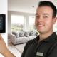 Smart Home Installation Keswick: Control panel, technician, modern living room.
