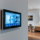 Sleek smart home setup for busy families by PowerSol, featuring integrated control panel, smart lighting, locks, and CCTV.